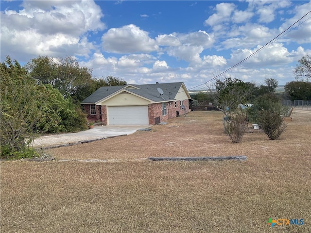 single story home with a garage