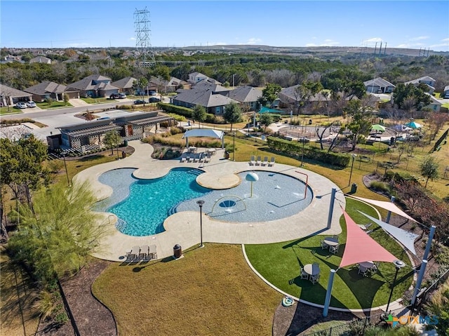 view of swimming pool featuring a patio area