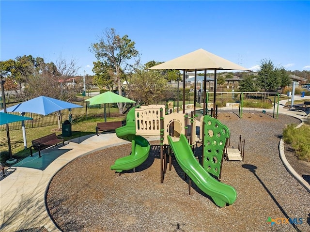 community play area featuring fence