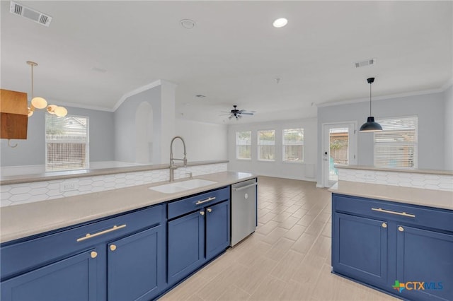 kitchen featuring dishwasher, blue cabinets, a ceiling fan, and a sink