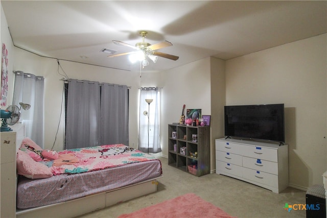 carpeted bedroom featuring ceiling fan