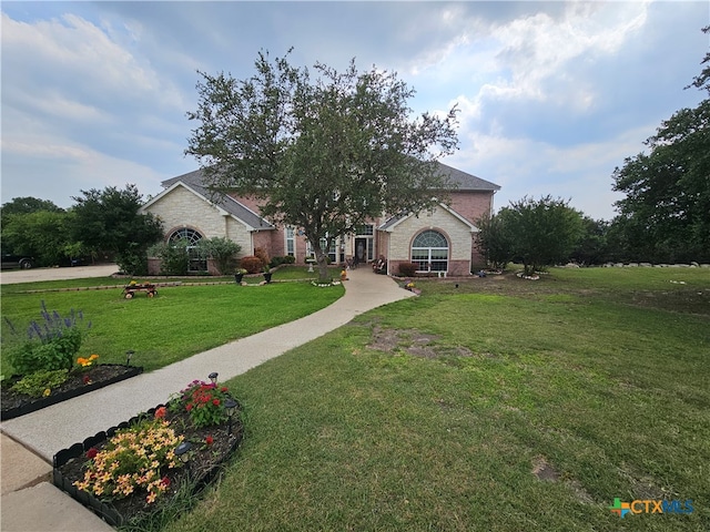 view of front of home with a front yard