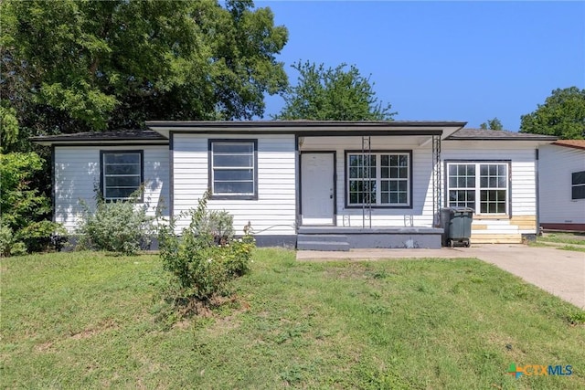1303 N W S Young Dr, Killeen, TX 76543 - view of front facade with a front lawn and covered porch