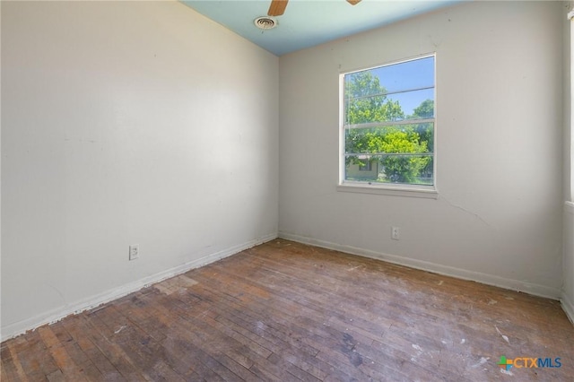 1303 N W S Young Dr, Killeen, TX 76543 - empty room with wood-type flooring and a ceiling fan