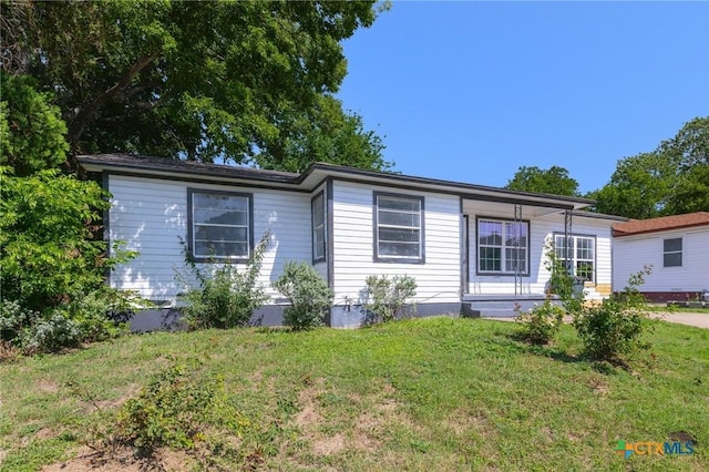 1303 N W S Young Dr, Killeen, TX 76543 - ranch-style house with a front yard