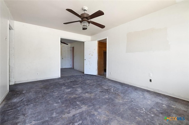 1303 N W S Young Dr, Killeen, TX 76543 - unfurnished bedroom featuring baseboards and ceiling fan