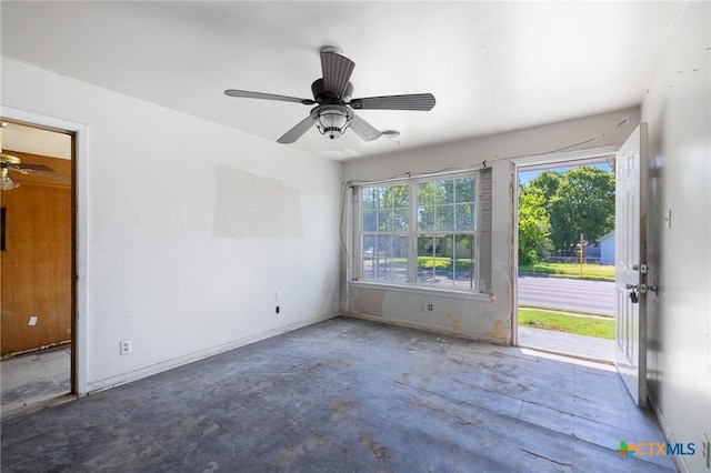 1303 N W S Young Dr, Killeen, TX 76543 - empty room featuring concrete flooring and a ceiling fan