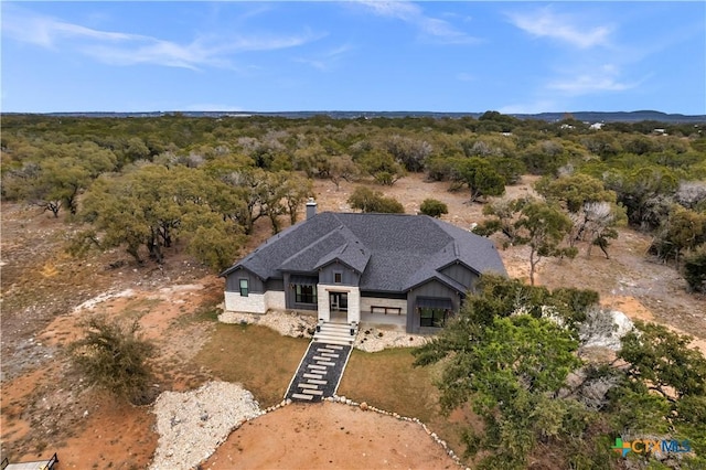 123 Wandering Oak Cir, Burnet, TX 78611 - view from above of property featuring a forest