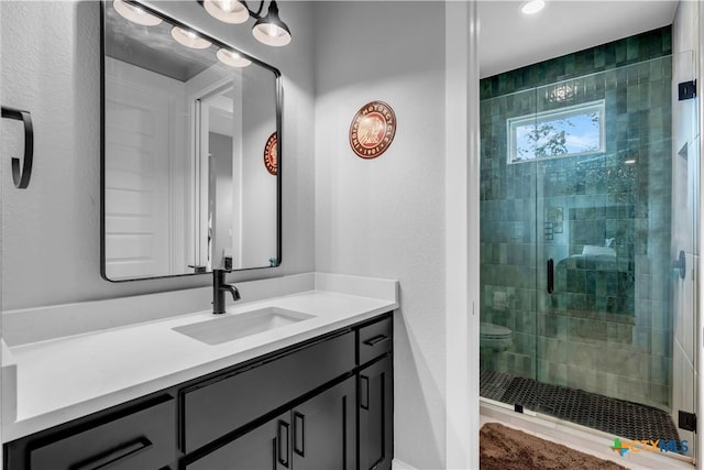 123 Wandering Oak Cir, Burnet, TX 78611 - bathroom featuring a shower stall, vanity, and toilet