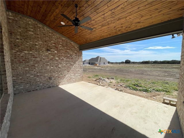 view of patio / terrace featuring ceiling fan