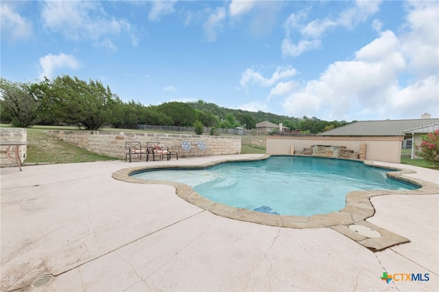 pool with a patio