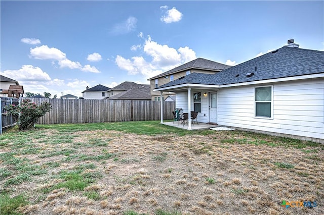 10016 Smock Mill Ln, Temple, TX 76502 - rear view of house featuring a fenced backyard and a patio area