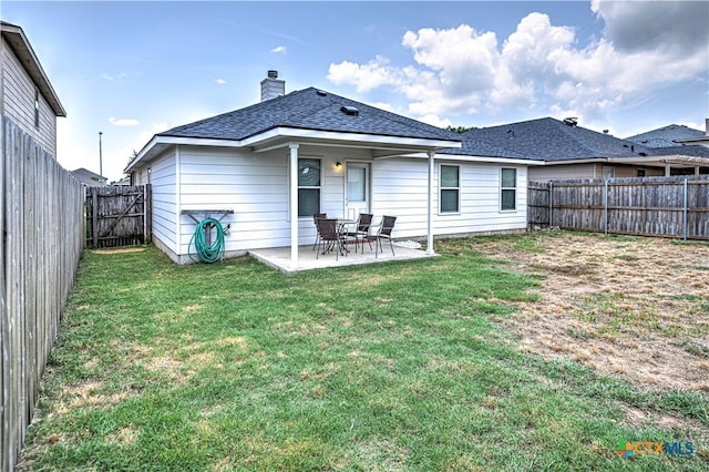 10016 Smock Mill Ln, Temple, TX 76502 - rear view of property featuring a fenced backyard, a patio, a chimney, and roof with shingles