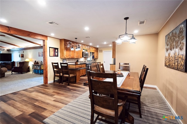 dining area featuring light hardwood / wood-style flooring