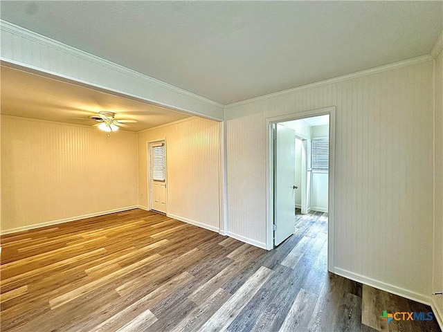 3301 Cypress St, Victoria, TX 77901 - unfurnished room with ornamental molding, wood finished floors, a ceiling fan, and baseboards