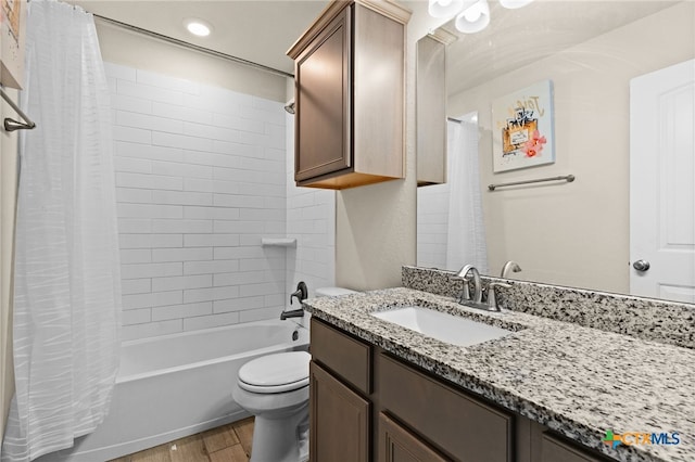 1203 Roma St, Harker Heights, TX 76548 - full bathroom featuring vanity, wood finished floors, toilet, and shower / bath combo with shower curtain