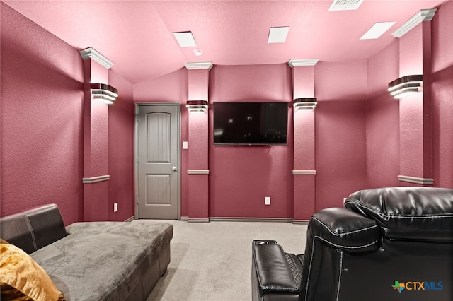 1203 Roma St, Harker Heights, TX 76548 - carpeted home theater with a textured wall, vaulted ceiling, and baseboards