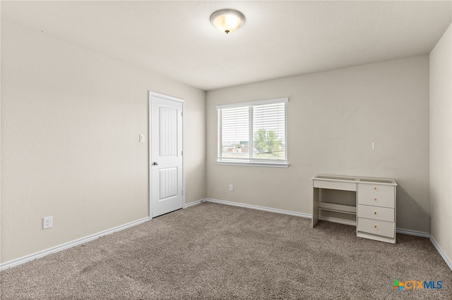 1203 Roma St, Harker Heights, TX 76548 - unfurnished bedroom featuring carpet flooring and baseboards