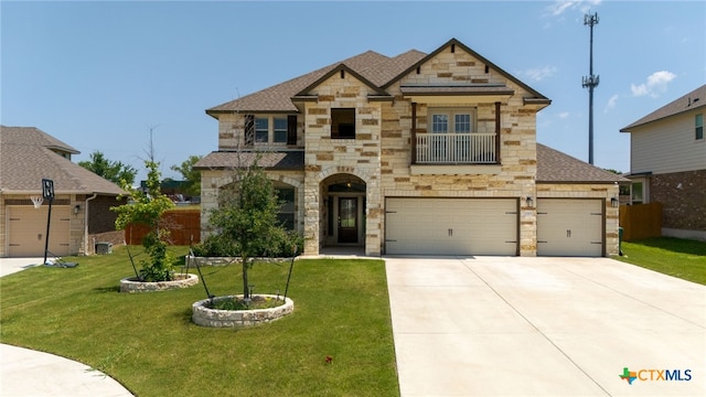 1203 Roma St, Harker Heights, TX 76548 - view of front of home with stone siding, concrete driveway, a front lawn, and a garage