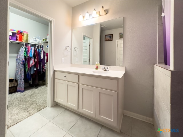 bathroom featuring tile patterned floors and vanity