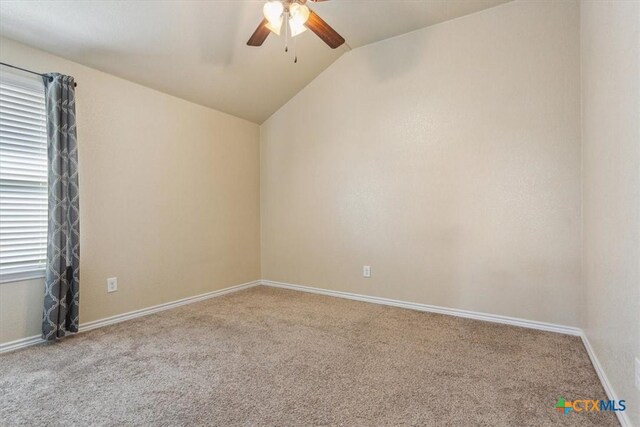 5907 Verde Dr, Killeen, TX 76549 - spare room with carpet floors, a ceiling fan, lofted ceiling, and baseboards