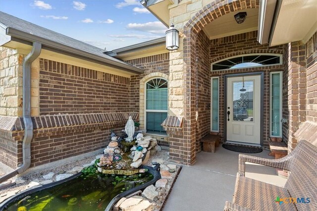 5907 Verde Dr, Killeen, TX 76549 - property entrance featuring brick siding