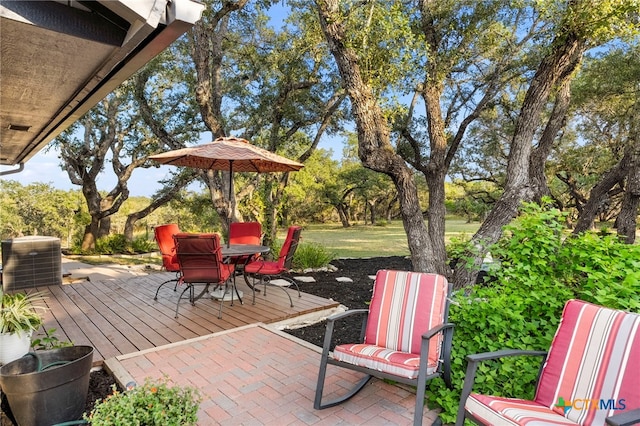 view of patio / terrace featuring central AC unit and a wooden deck