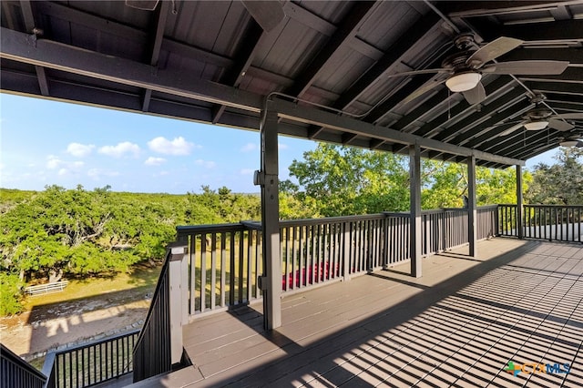 wooden deck with ceiling fan