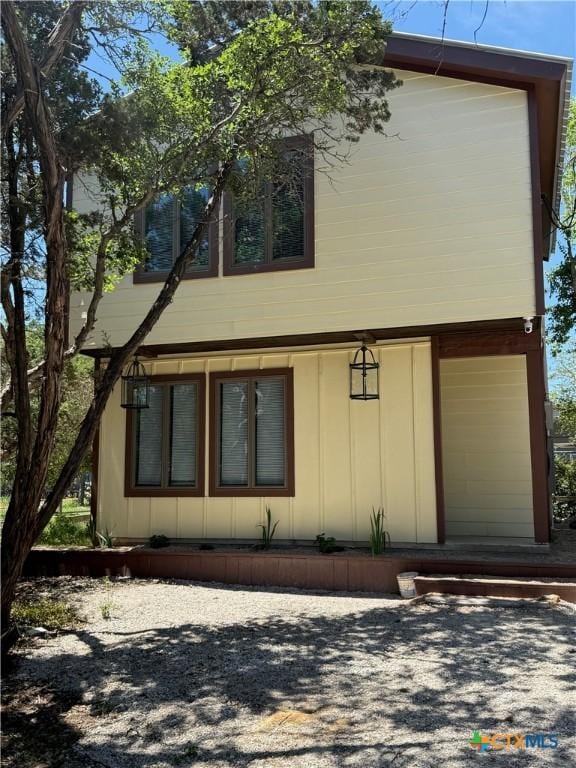 view of side of property with board and batten siding