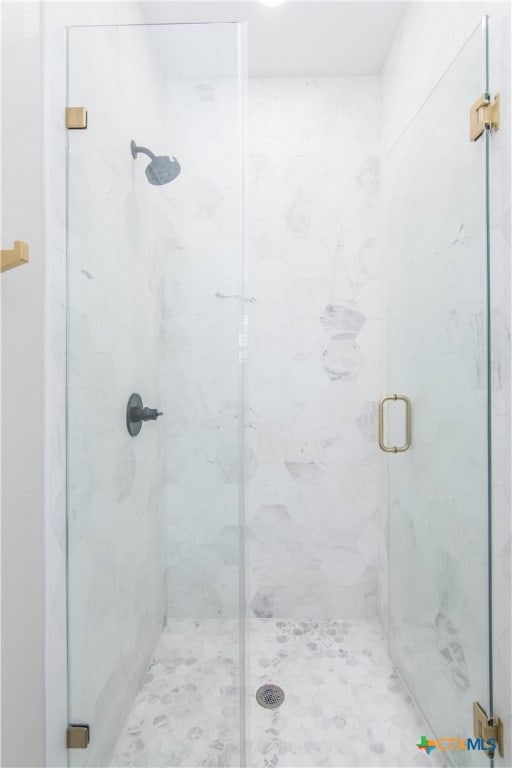 bathroom featuring walk in shower