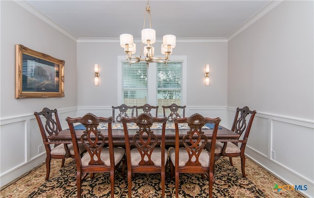 dining area featuring an inviting chandelier and ornamental molding