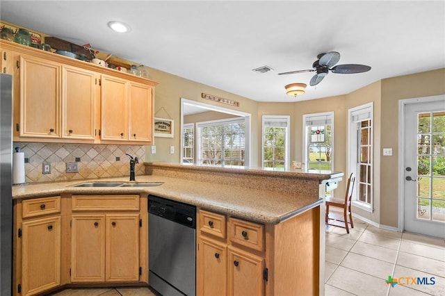 4 Longview Dr, Victoria, TX 77904 - kitchen featuring stainless steel dishwasher, a peninsula, tasteful backsplash, light tile patterned floors, and a ceiling fan