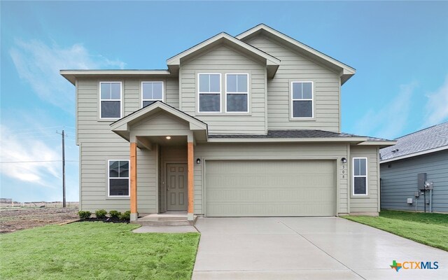 308 Angus Dr, Seguin, TX 78155 - view of front of home featuring an attached garage, a front yard, and driveway