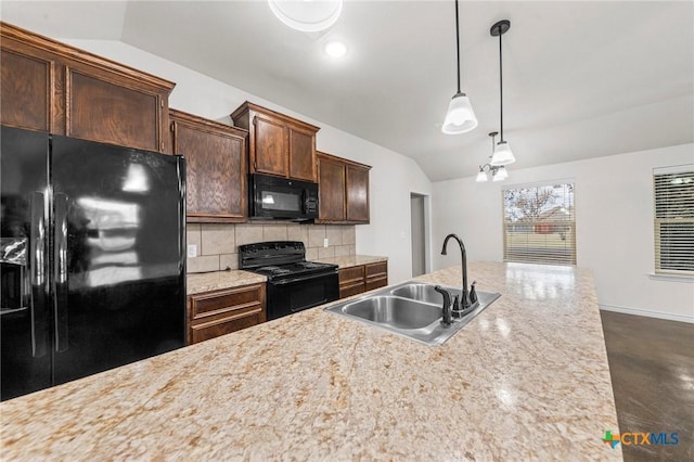 kitchen featuring black appliances, sink, backsplash, hanging light fixtures, and vaulted ceiling