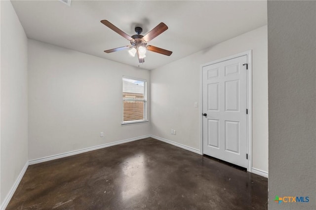 unfurnished room with ceiling fan