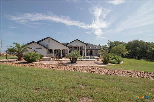 547 Powder Rdg, Luling, TX 78648 - back of house featuring stucco siding