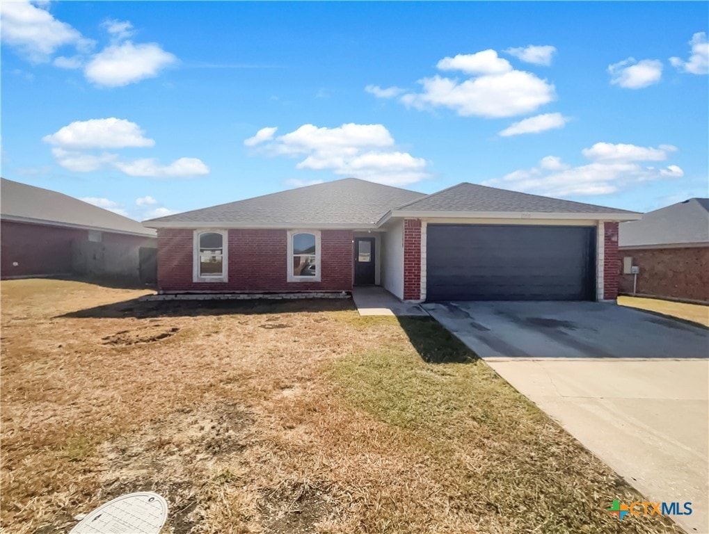 ranch-style house with a garage