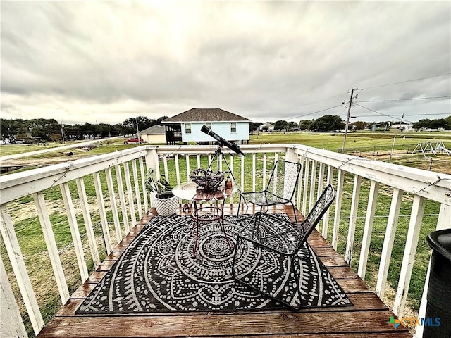 wooden balcony featuring a wooden deck