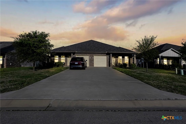 1121 Swanflower Ln, Temple, TX 76502 - ranch-style house with a garage, a front lawn, and concrete driveway