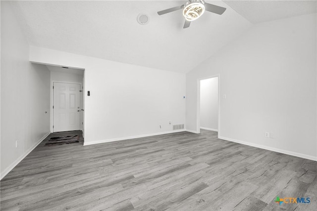 1206 Amthor Ave, Copperas Cove, TX 76522 - empty room with ceiling fan, wood finished floors, vaulted ceiling, and baseboards