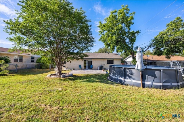 1206 Amthor Ave, Copperas Cove, TX 76522 - back of house with a patio area