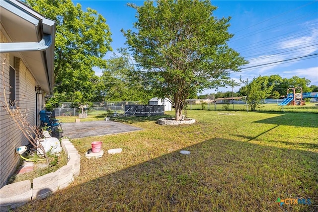 1206 Amthor Ave, Copperas Cove, TX 76522 - view of yard featuring a patio and a playground