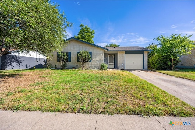 1206 Amthor Ave, Copperas Cove, TX 76522 - single story home with brick siding, a garage, driveway, and a front lawn