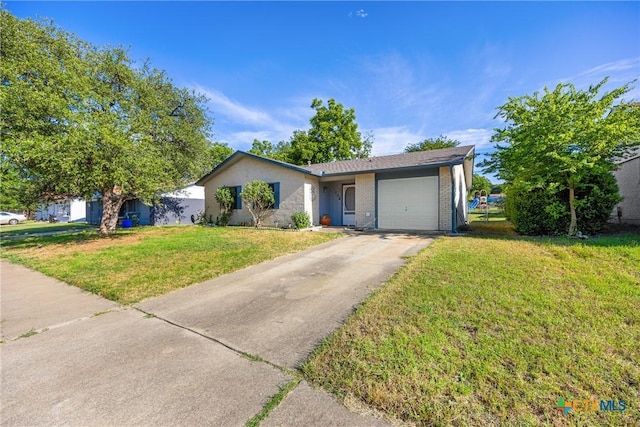 1206 Amthor Ave, Copperas Cove, TX 76522 - ranch-style house with an attached garage, concrete driveway, a front yard, and brick siding