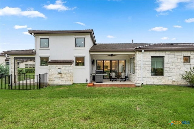 119 Rivalto Dr, Horseshoe Bay, TX 78657 - back of house featuring a patio, a ceiling fan, stone siding, and stucco siding