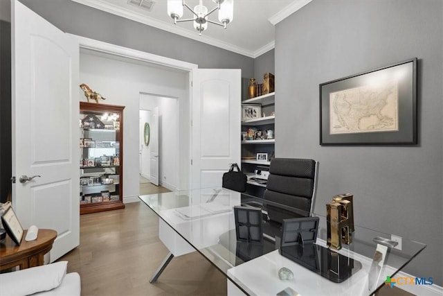 119 Rivalto Dr, Horseshoe Bay, TX 78657 - office area with crown molding, a chandelier, and wood finished floors
