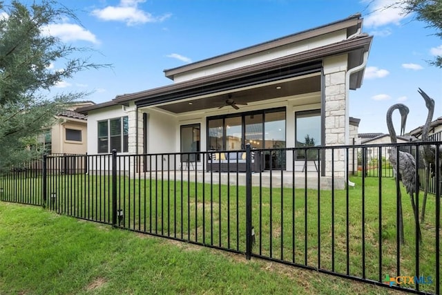 119 Rivalto Dr, Horseshoe Bay, TX 78657 - back of property featuring stone siding, ceiling fan, a patio, and stucco siding