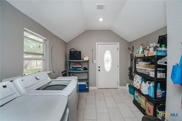laundry room with independent washer and dryer, laundry area, visible vents, and a healthy amount of sunlight
