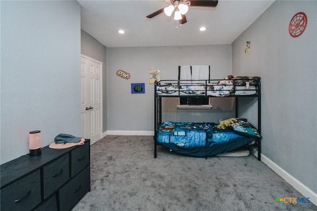 carpeted bedroom featuring recessed lighting, baseboards, and ceiling fan