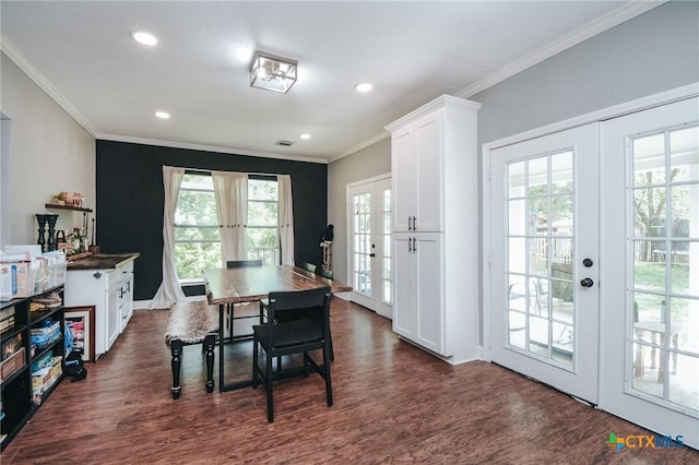 dining space with recessed lighting, ornamental molding, french doors, and dark wood finished floors